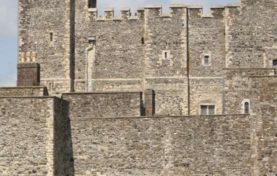 Image: Exterior photo of the outer walls and keep of Dover Castle in Kent